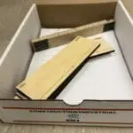 A box of construction material is shown.