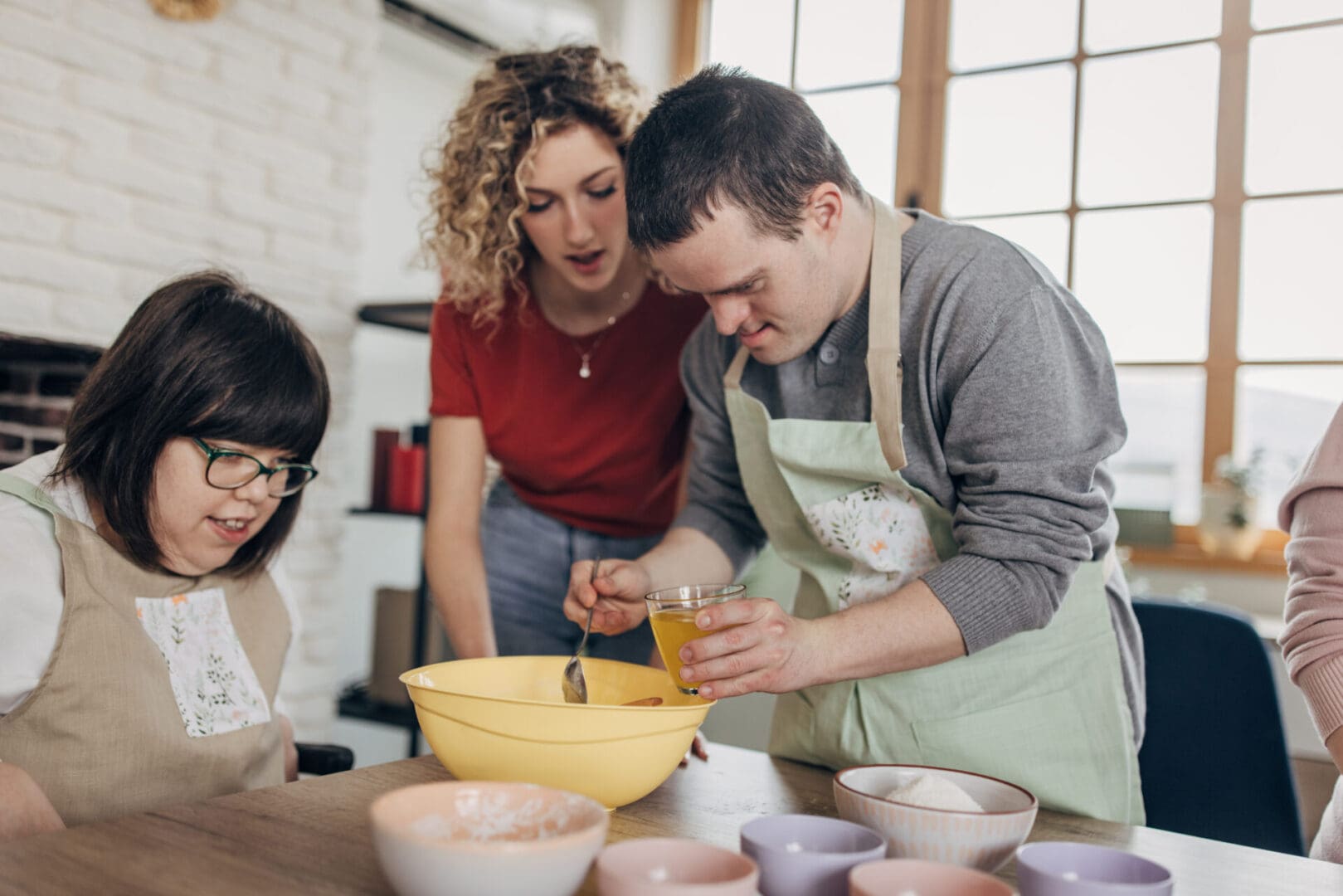 Students preparing food in work lab setting